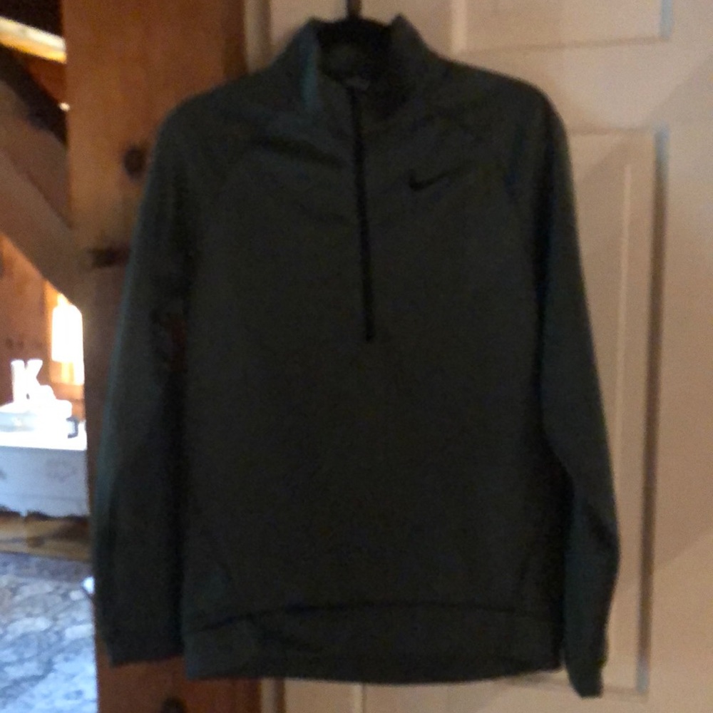 Fleece lined Nike Men’s  3/4 Zip Top. Size S.